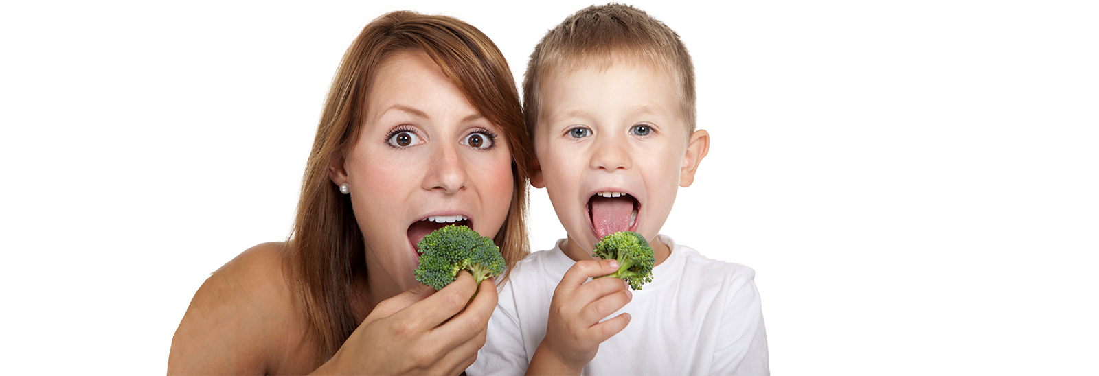 Picture of mother and son eating broccoli. 
