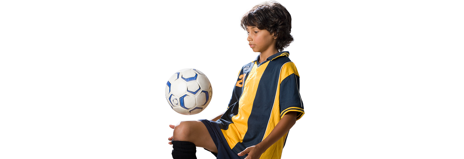 Photo of boy playing soccer.